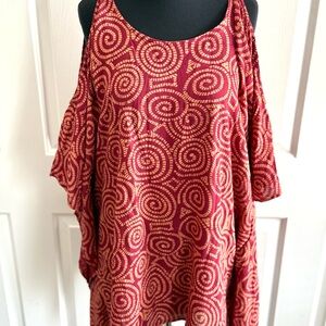 Rust and peach top with cut out arms.